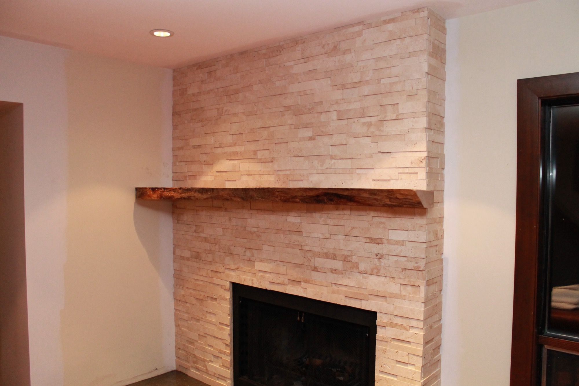 Jacquline's Fireplace after renovation, Cochrane